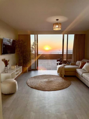 Infinity Sunset Beachfront Apartment